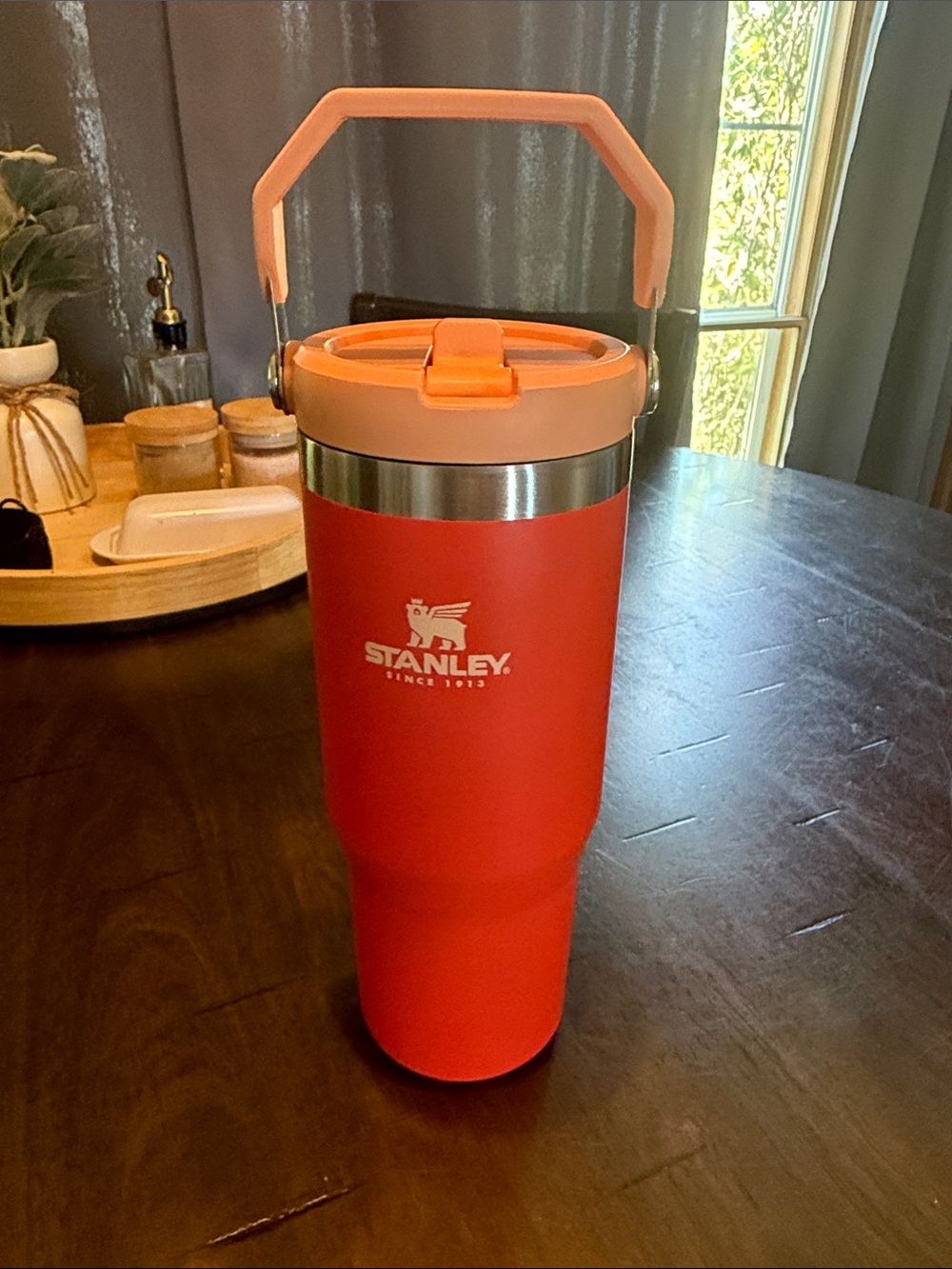 Stanley orange Travel Tumbler with light orange Handle